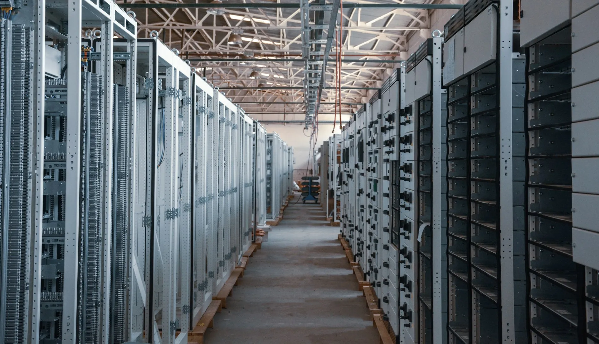 A data centre aisle lined with equipment racks