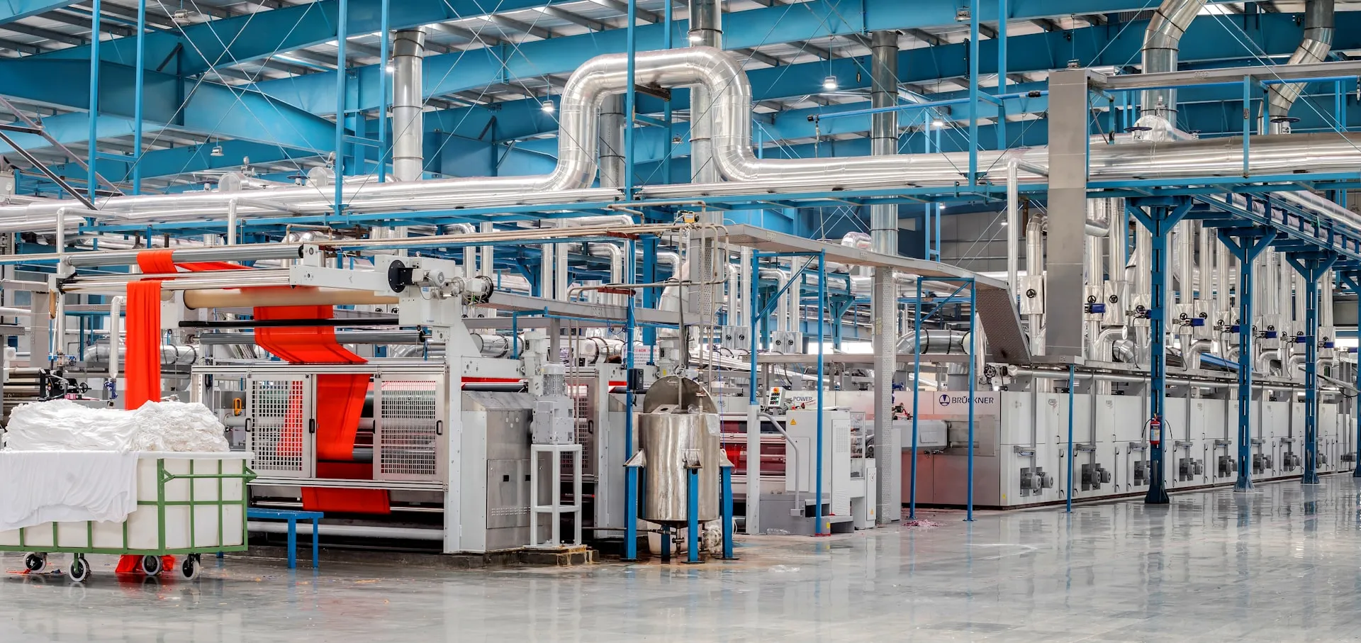 Industrial machinery and pipework inside a factory